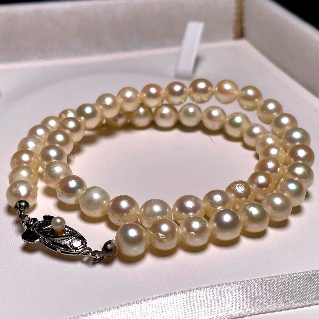 Akoya pearl semi-baroque necklace 7.0-7.4mm white pearls on silver chain length 39.1 cm