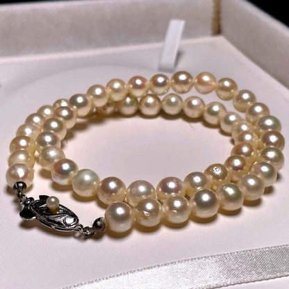 Akoya pearl semi-baroque necklace 7.0-7.4mm white pearls on silver chain length 39.1 cm