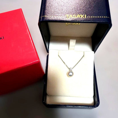 TASAKI pearl necklace with 8.1mm white pearl and 0.11ct diamond pendant on a fine chain