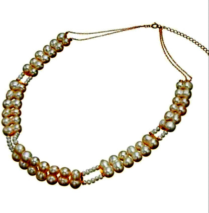 Agete pearl necklace with two-layered design combining large and small 10k pearls