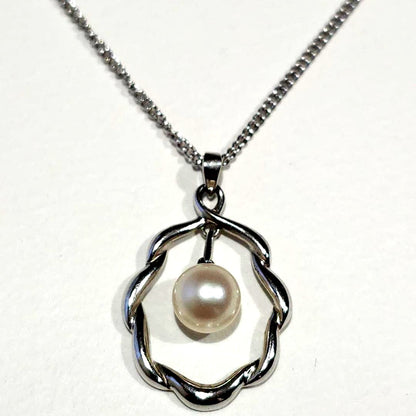 1367 Mikimoto Pearl Necklace with 7mm pearls on 42cm silver chain