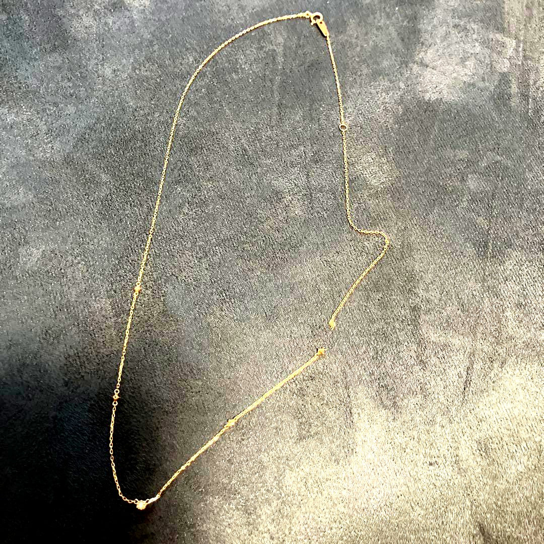 agete pendant necklace in 10k gold with diamond center stone and broken chain