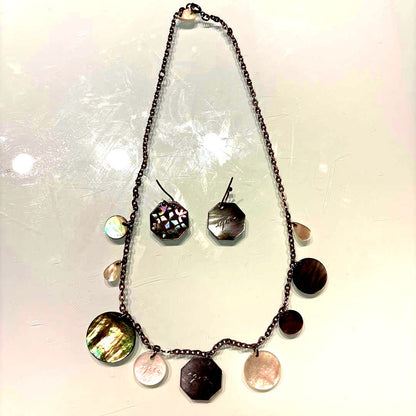 Agete necklace with chain and shell charm paired with hook earrings featuring an octagonal motif and storage pouch