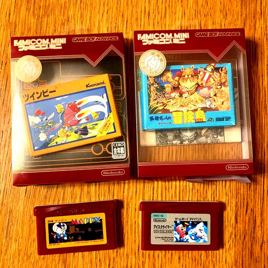 Famicom Mini Game Boy Advance software set with four game cartridges and boxes for Twinbee and Takahashi Meijin no Bouken Jima