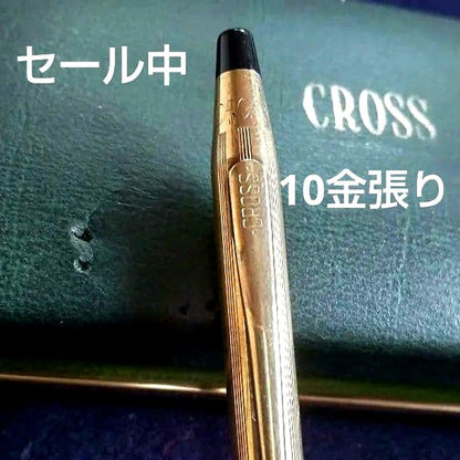 Cross ballpoint pen with 10K gold plating and black ink, measuring 13 cm long