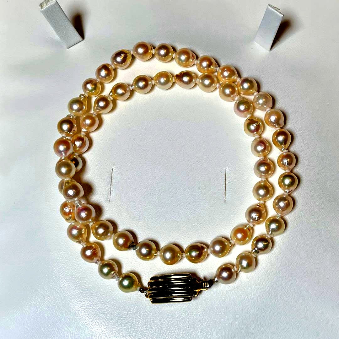 Akoya pearl semi-long necklace with round 6.6-7.0mm white pearls and silver coil clasp, 46cm length