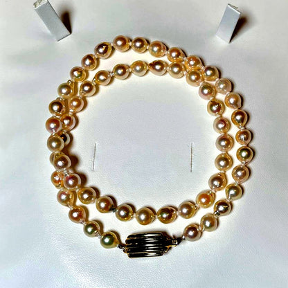 Akoya pearl semi-long necklace with round 6.6-7.0mm white pearls and silver coil clasp, 46cm length