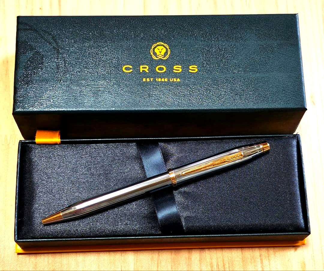 Cross Classic Century Medalist twist ballpoint pen with black ink and silver gold metal body in dedicated case