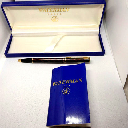 Waterman ballpoint pen in red and gold with sleek design and smooth writing tip