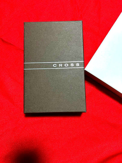 Silver metal Cross ballpoint pen with accompanying black leather case