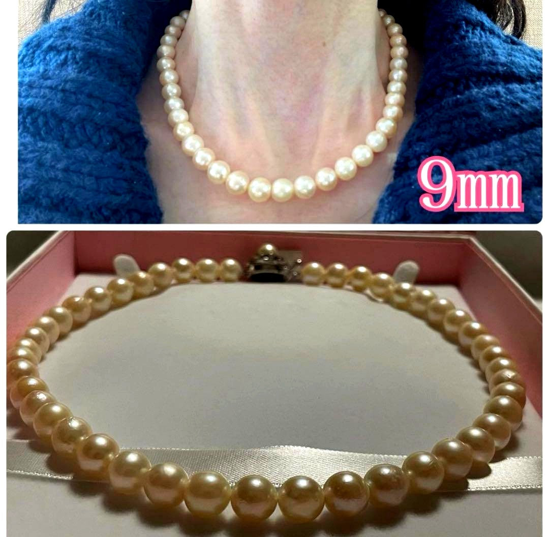 Akoya Pearl Necklace with one 9mm round pearl in slight champagne gold on silver chain with double lock