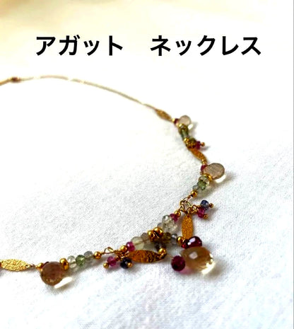 Agaat stone necklace with multi-stone gold color 10k chain featuring red and green stones