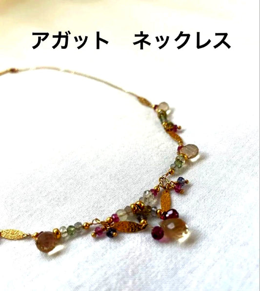 Agaat stone necklace with multi-stone gold color 10k chain featuring red and green stones