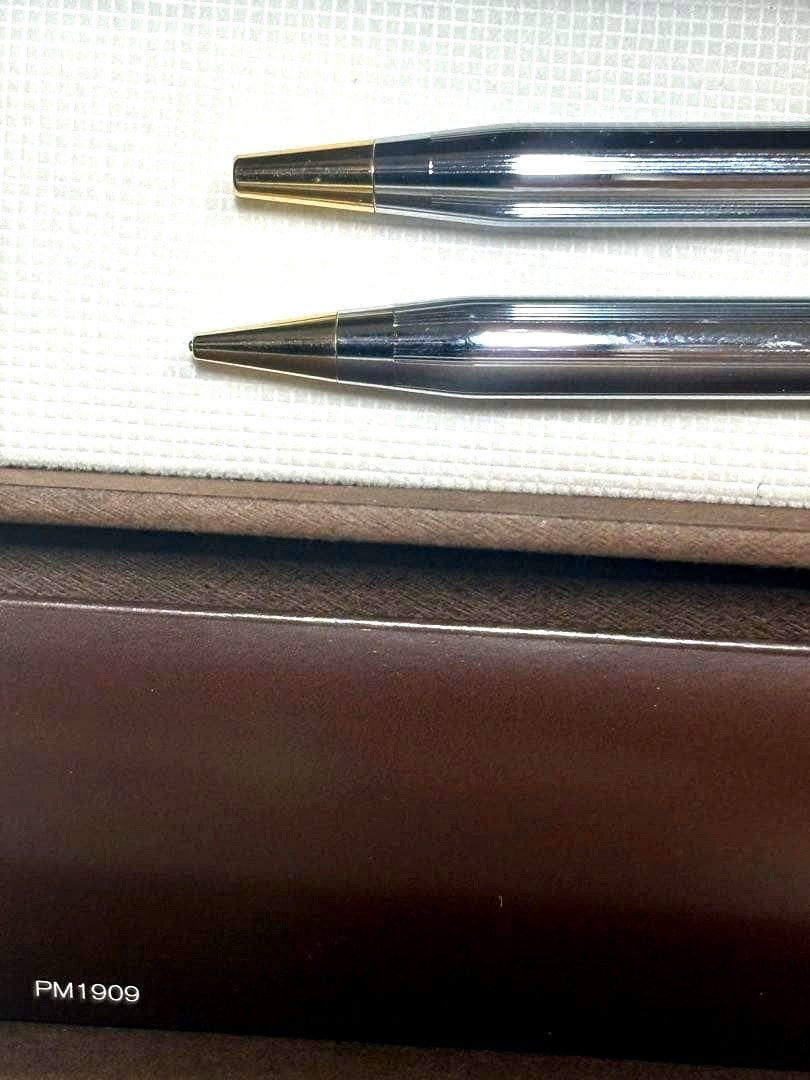 Cross Classic Century rotating push-button ballpoint pen and mechanical pencil set with silver and gold accents in a presentation case