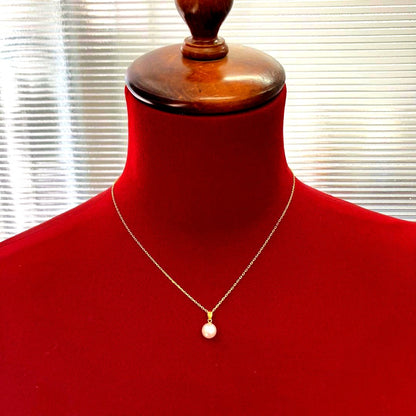 Mikimoto Akoya pinkish pearl necklace with 39cm K18 gold chain showing high lustre