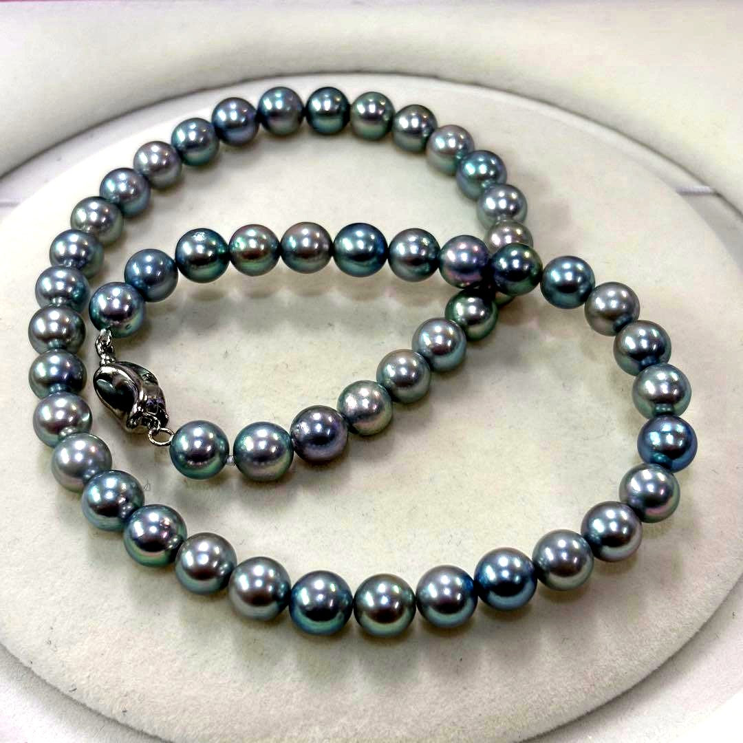 Elegant Akoya pearl necklace featuring 7.5-8mm pearls and 42cm length with a 925 stamped clasp