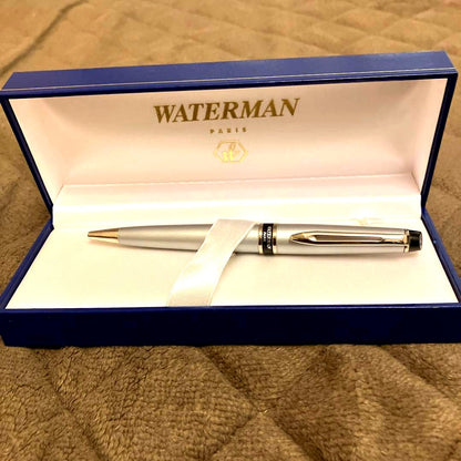Waterman ballpoint pen with twist mechanism and included case displayed on white background