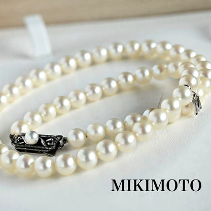 Highest grade Hanadama Mikimoto Akoya pearl necklace with 6.5mm round pearls and silver chain length 37cm