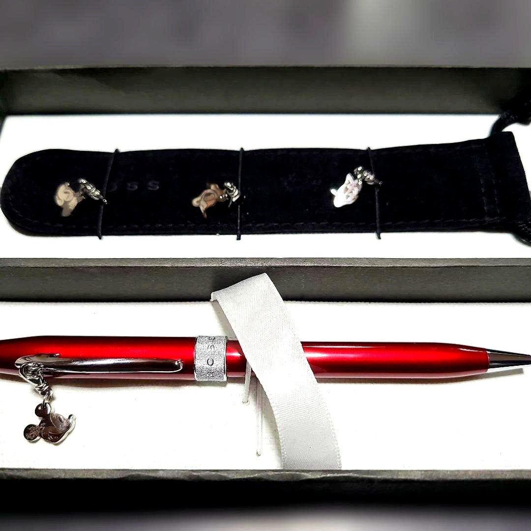 Red Sentiment ballpoint pen by CROSS with metal body and charm with ribbon, simple and elegant design