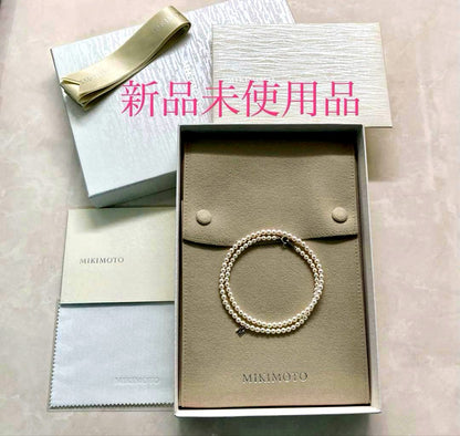 Mikimoto baby pearl necklace with 3.5-4mm pearls, silver lever clasp, and M charm on a 42cm chain