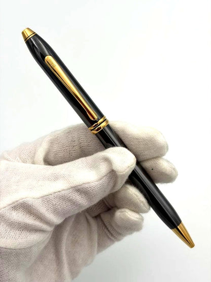 Cross Townsend Series ballpoint pen with black lacquer finish and gold accents, twist mechanism, 5.3 inches long