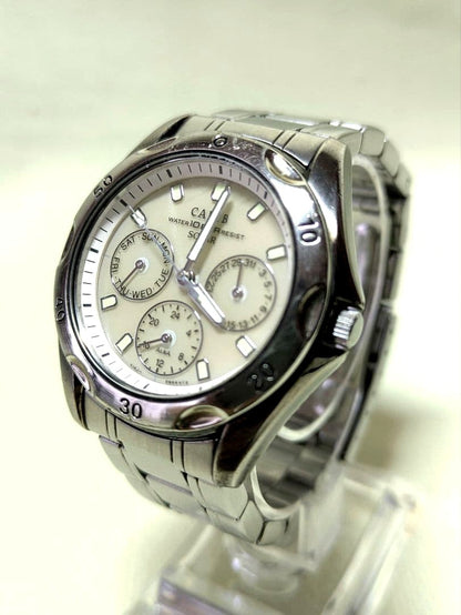 Silver Casio Carib SolarV14J 0A80 chronograph watch with date and day display on a wrist