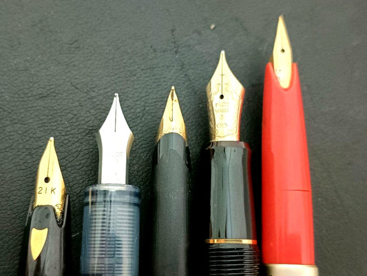 Set of 5 fountain pens including PILOT brand with 21K and 14K gold nibs in black, red, and silver colors