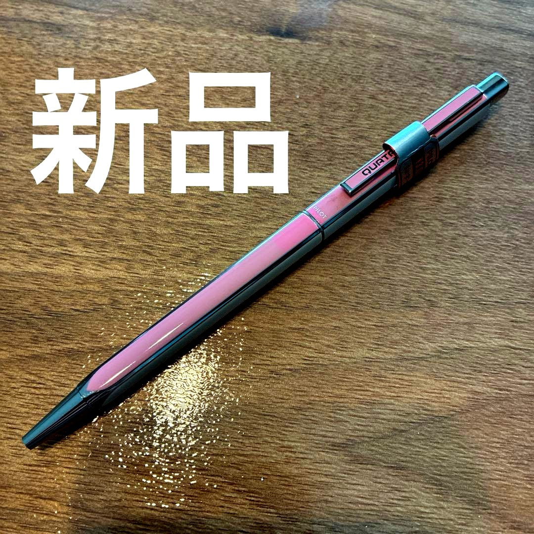 PILOTQUATRO fine black ballpoint pen in pink and white with silver striped design