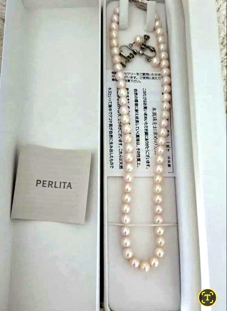 Mikimoto Necklace and Earrings set featuring pink pearls in a classic design with box and manual included