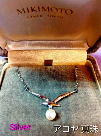 MIKIMOTO Akoya Pearl Necklace in silver with 37 cm length shown on white background