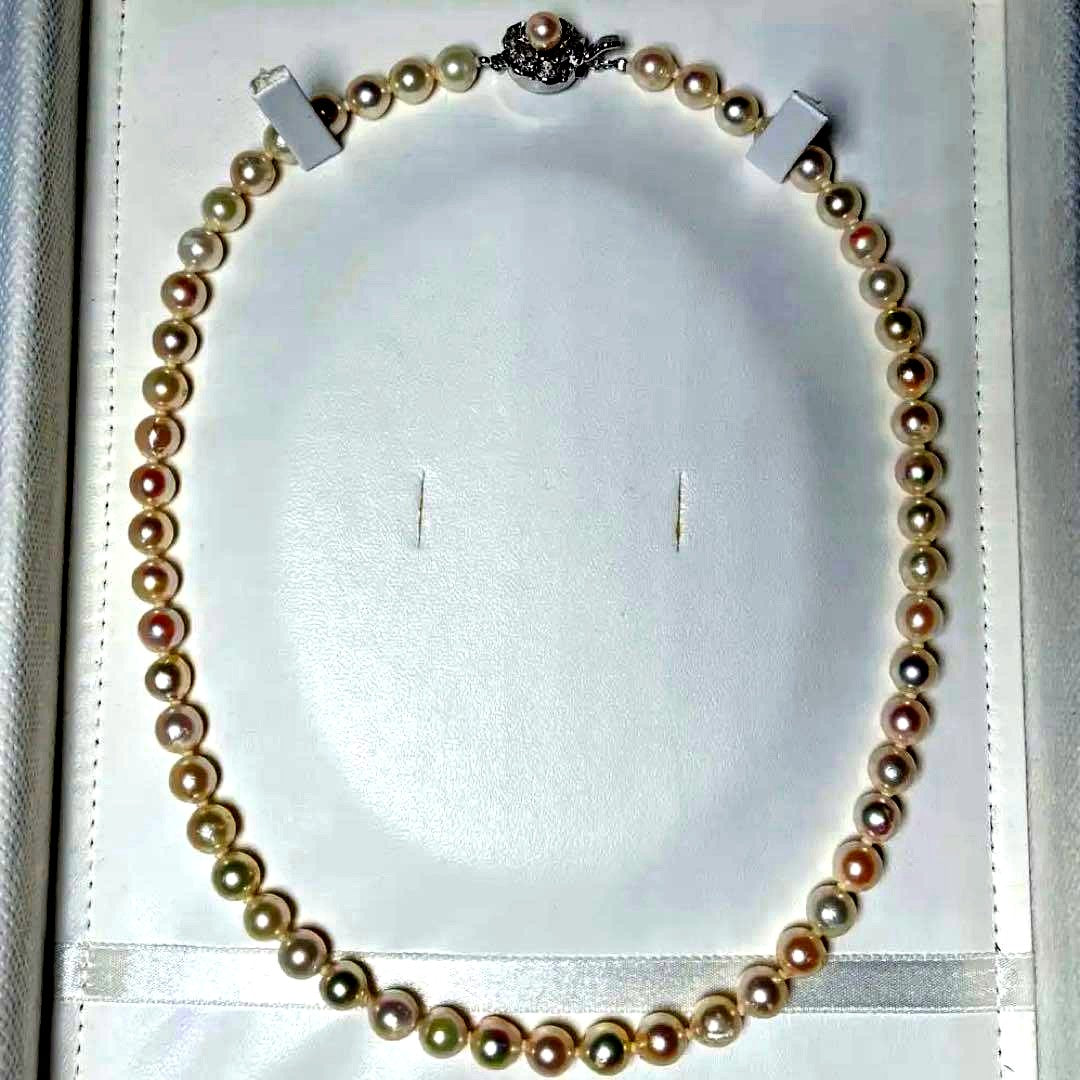 Akoya pearl necklace featuring 7.0-7.4mm semi-baroque white pearls on a 44cm silver chain
