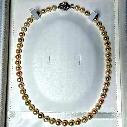 Akoya pearl necklace featuring 7.0-7.4mm semi-baroque white pearls on a 44cm silver chain