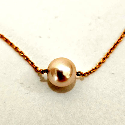 Tasaki pearl necklace with 7.3mm pearl on 42cm 18K yellow gold chain, vintage 2000s-2013