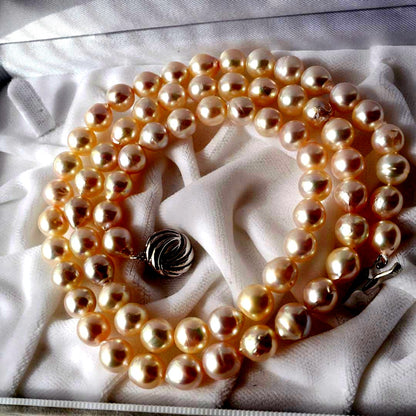 Akoya Pearl Baroque Necklace with pink 8.4-7.6mm pearls on 61cm gold and silver chain from Japan