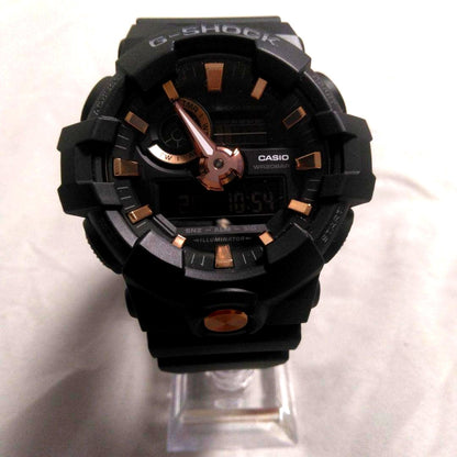 Casio G-Shock GA-710B analog digital watch with matte black body and rose gold hands and markers