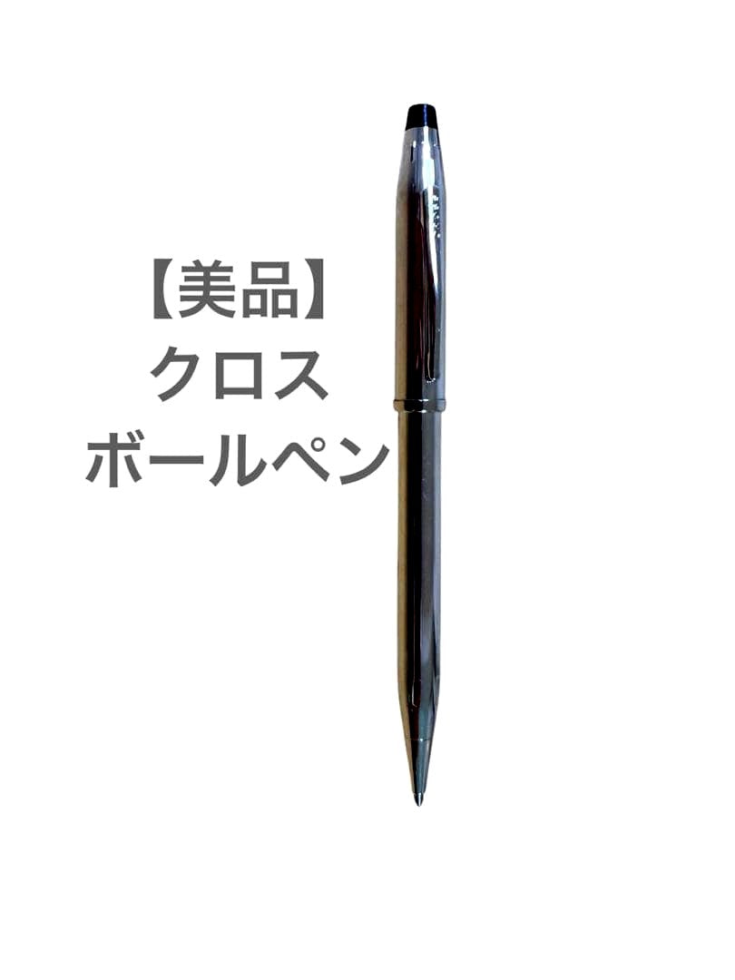 Cross silver ballpoint pen with clip and red ink refill shown on white background
