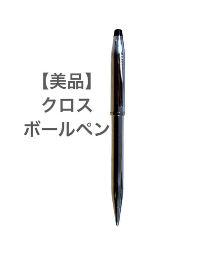 Cross silver ballpoint pen with clip and red ink refill shown on white background