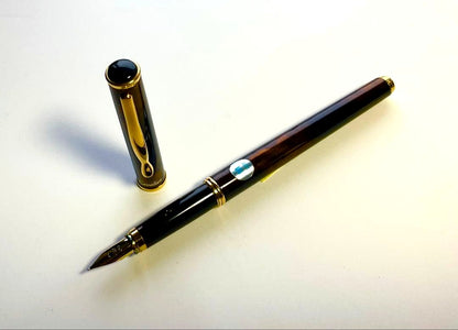 PILOT Cavalier fountain pen in black and brown marble pattern with medium nib, capped, 141mm length