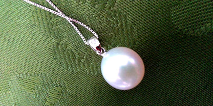 Mikimoto single 10mm white Akoya pearl pendant with K18WG adjustable chain