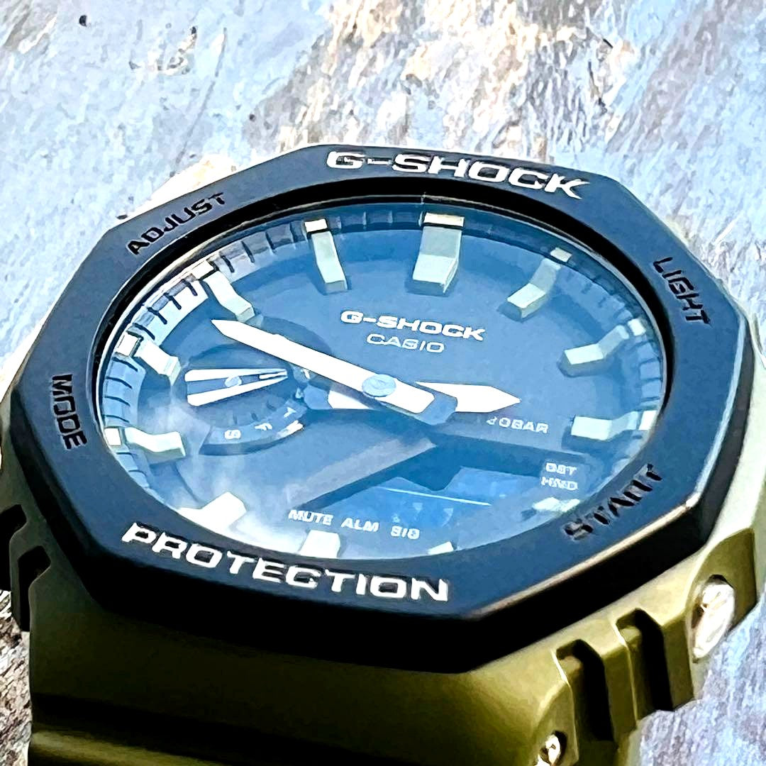 Casio G-Shock GA-2110SU-3AJF olive green watch with octagonal bezel and analog-digital display