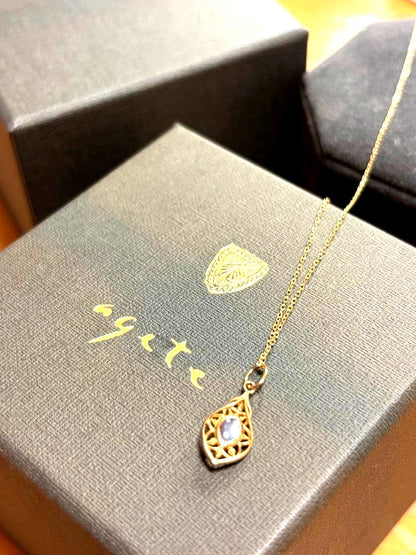 Agete K10 Multi-Stone Charm Necklace with yellow garnet and shell charms on a 45cm yellow gold chain