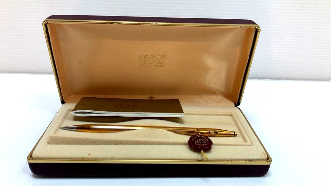 Used Cross 18KT Gold Mechanical Pencil 0.5mm with original case, showing signs of wear and scratches