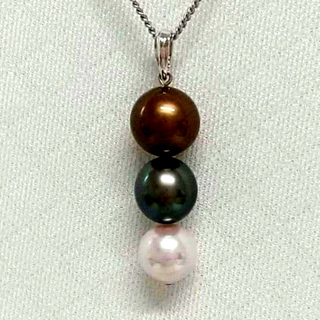 Law pendant with three round Tahiti black and Akoya pearls in varying colors on a service chain
