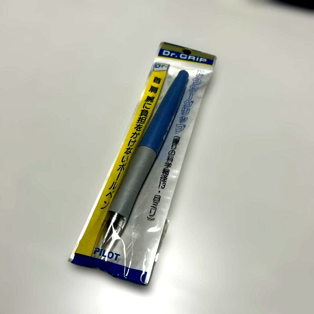 Initial Dr. Grip capped ballpoint pen in blue, brand new and unopened, shown with cap on