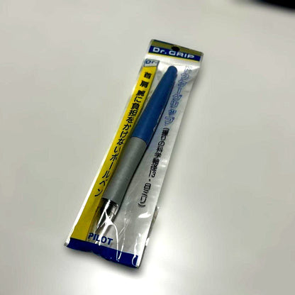 Initial Dr. Grip capped ballpoint pen in blue, brand new and unopened, shown with cap on