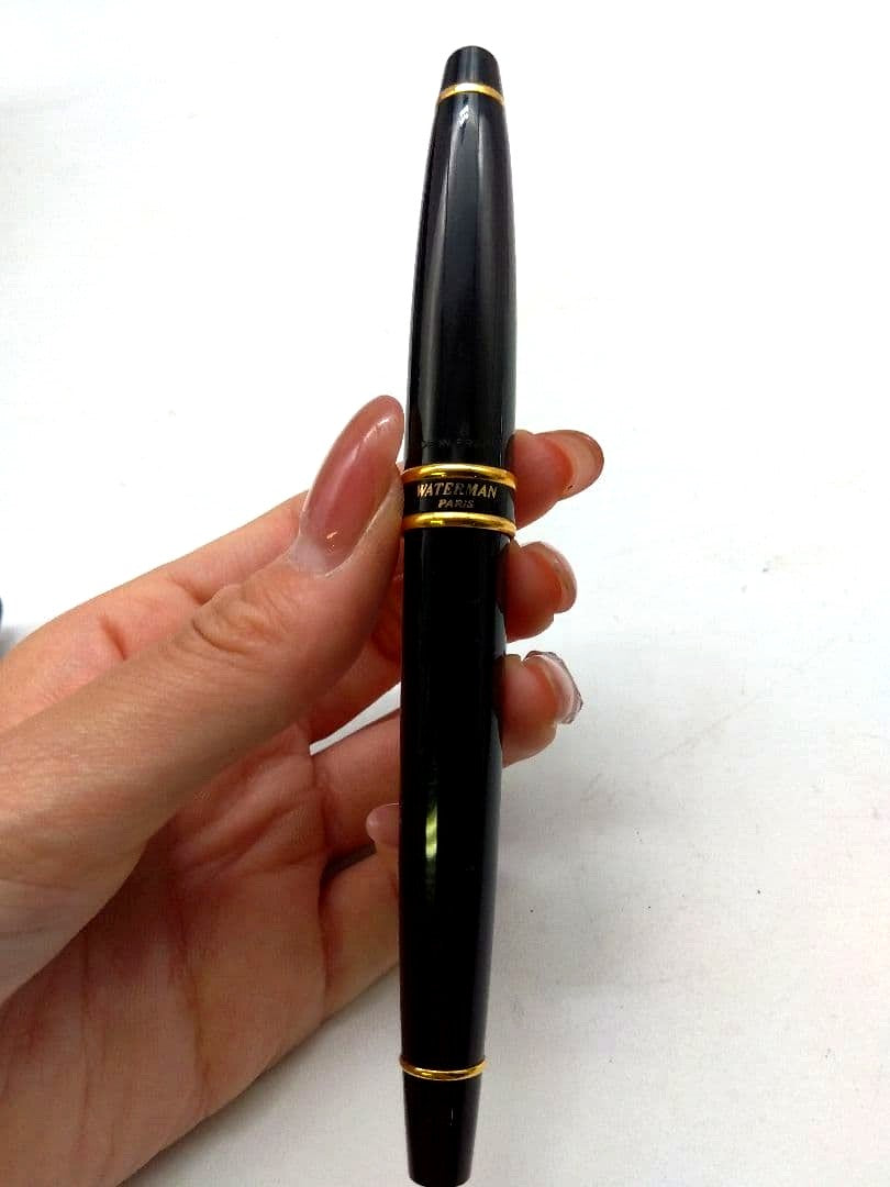 Waterman fountain pen with black body and gold accents, manufactured in France