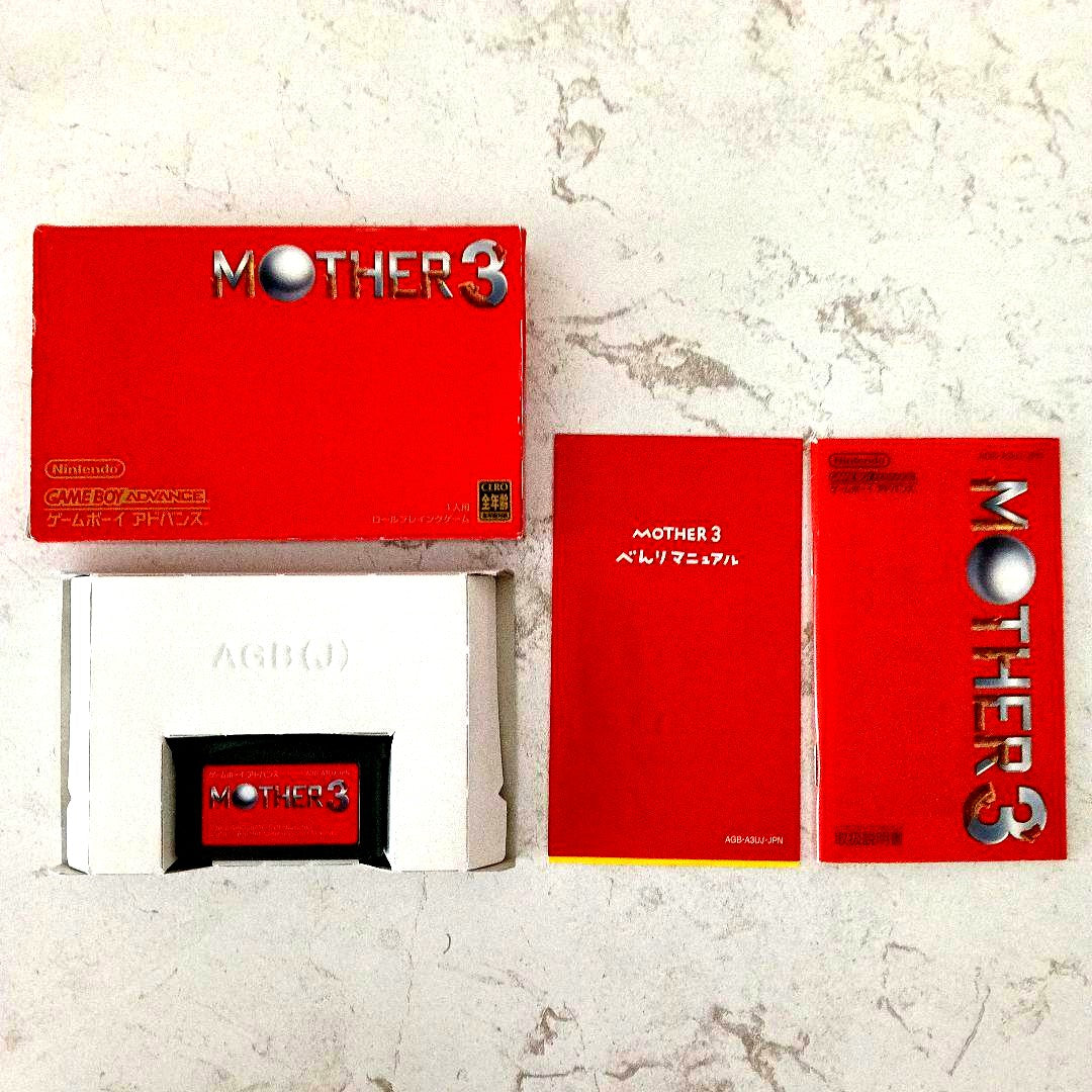 MOTHER3 Game Boy Advance cartridge with original box and manual displayed