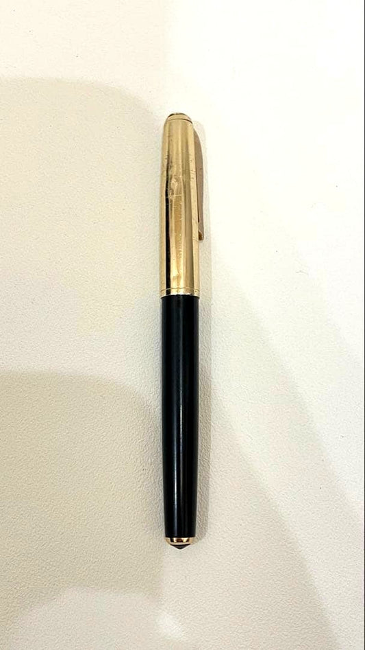 PILOT Fountain Pen with 14K gold nib and sleek black barrel, elegant writing instrument