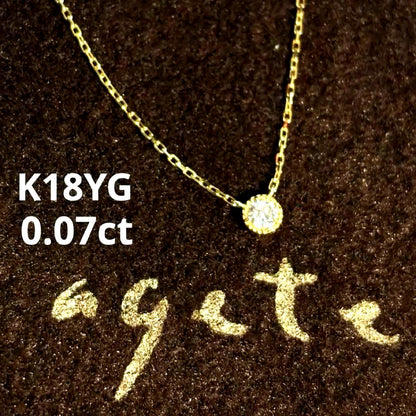 Agete K18 yellow gold necklace with millegrain diamond accents and single Akoya pearl on adjustable 40 cm chain