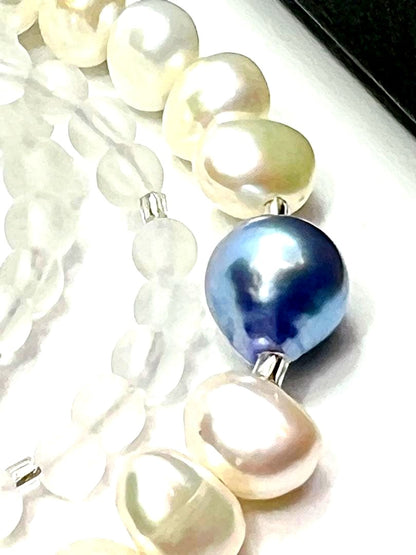 Owari Akoya pearl necklace featuring black and indigo blue pearls with baroque pearls and frozen quartz accents
